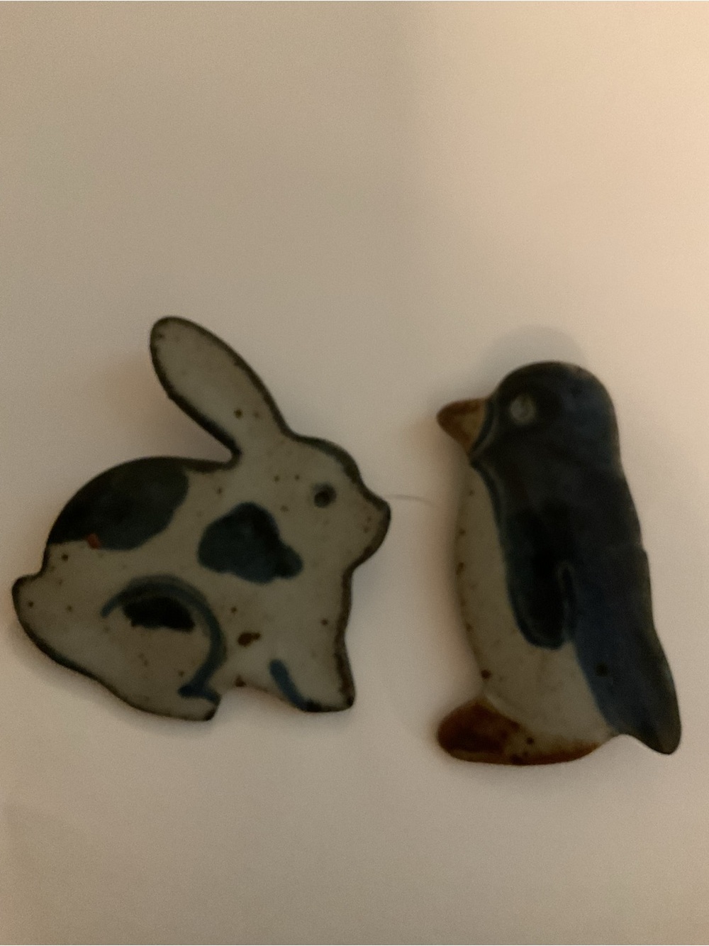 Two Blue Ceramic Bunny and Penguin Pins